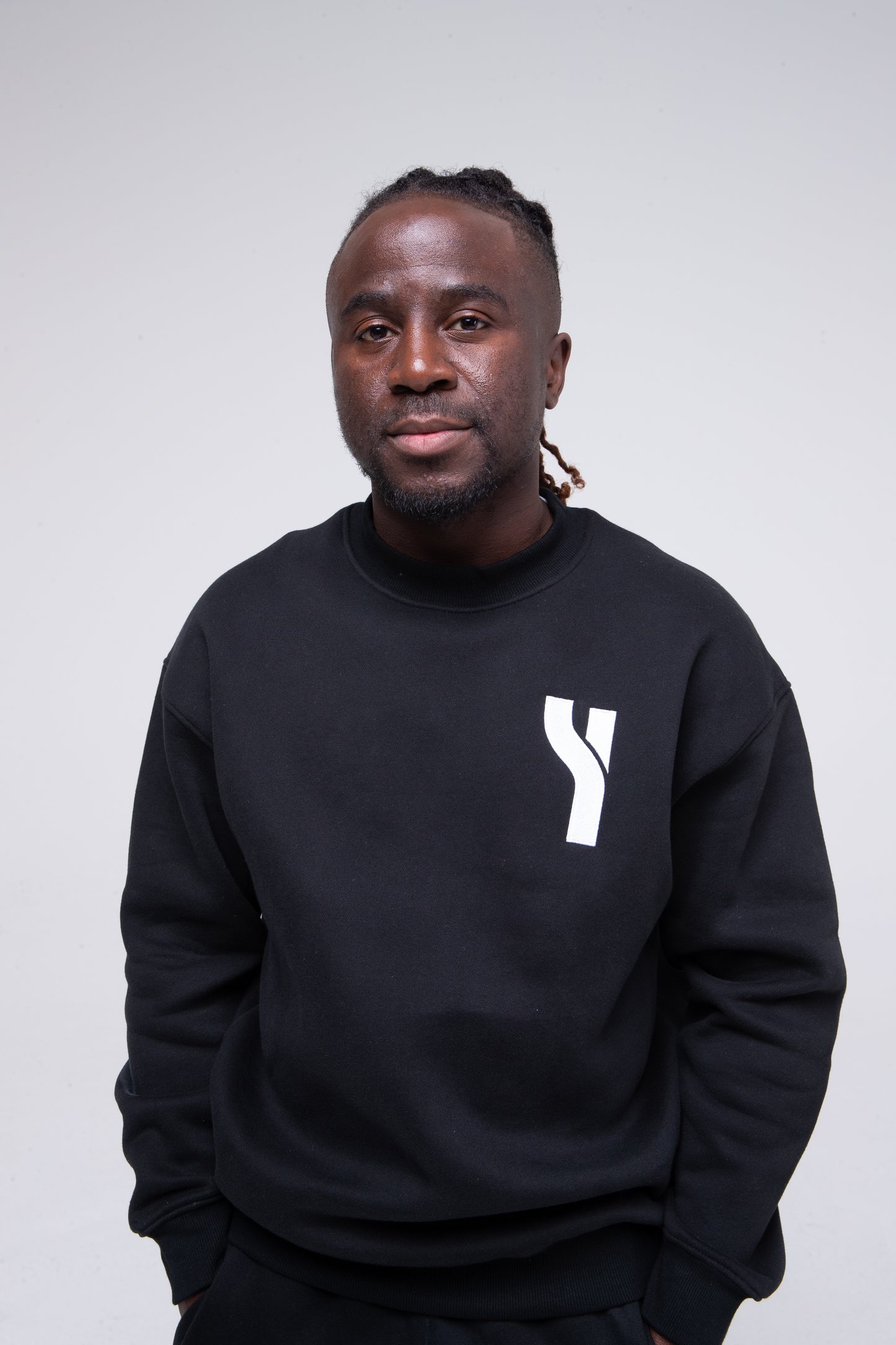 Cosy Crewneck Sweater in black model shot zoomed to show product detail