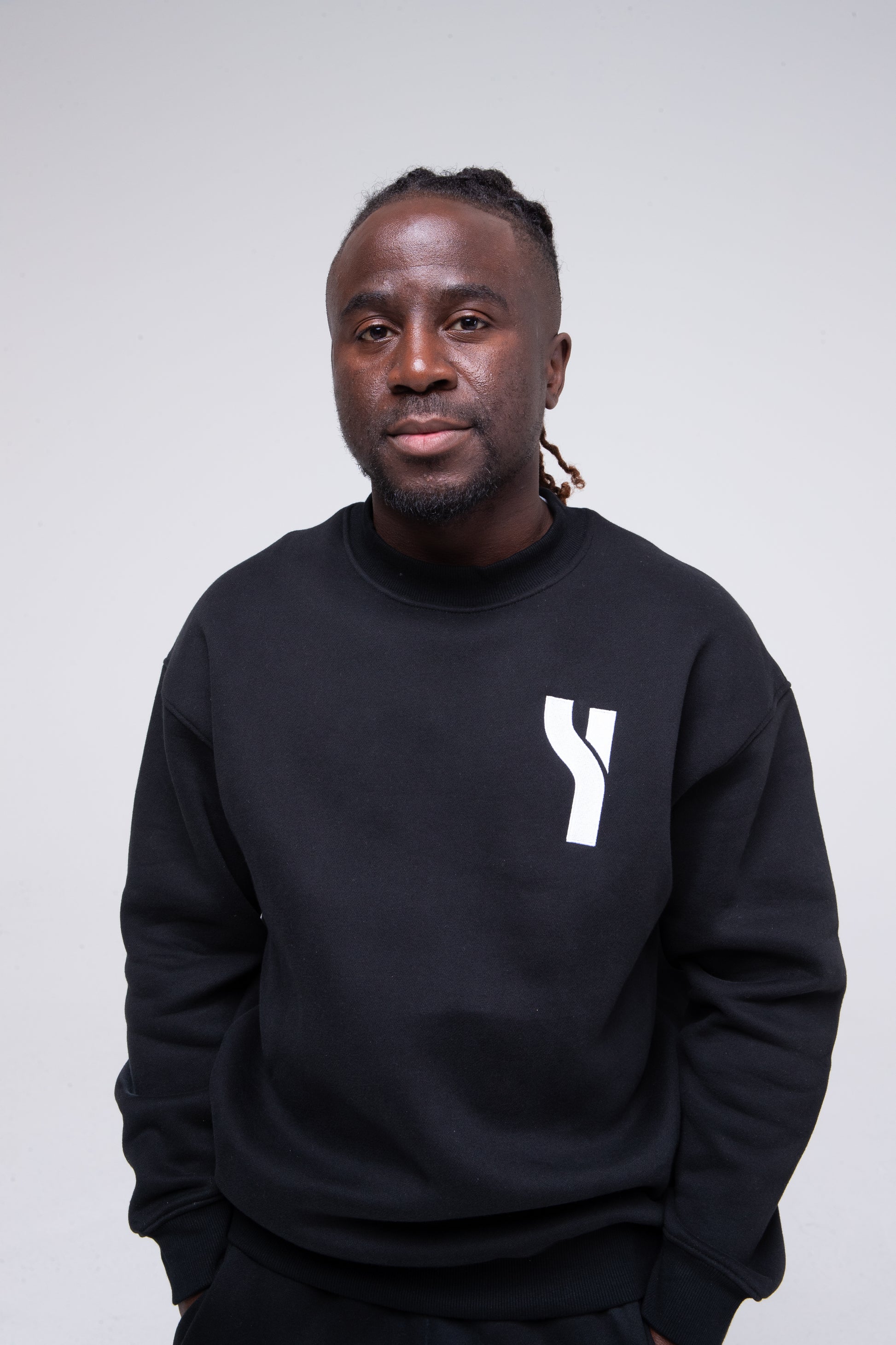 Cosy Crewneck Sweater in black model shot zoomed to show product detail