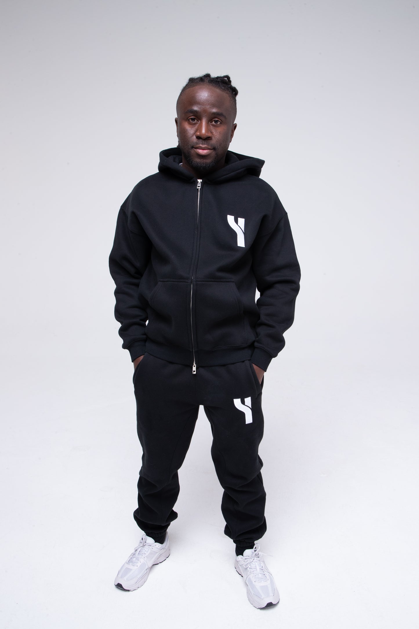 Cosy Zip Hoodie in black full height model shot from the front active pose