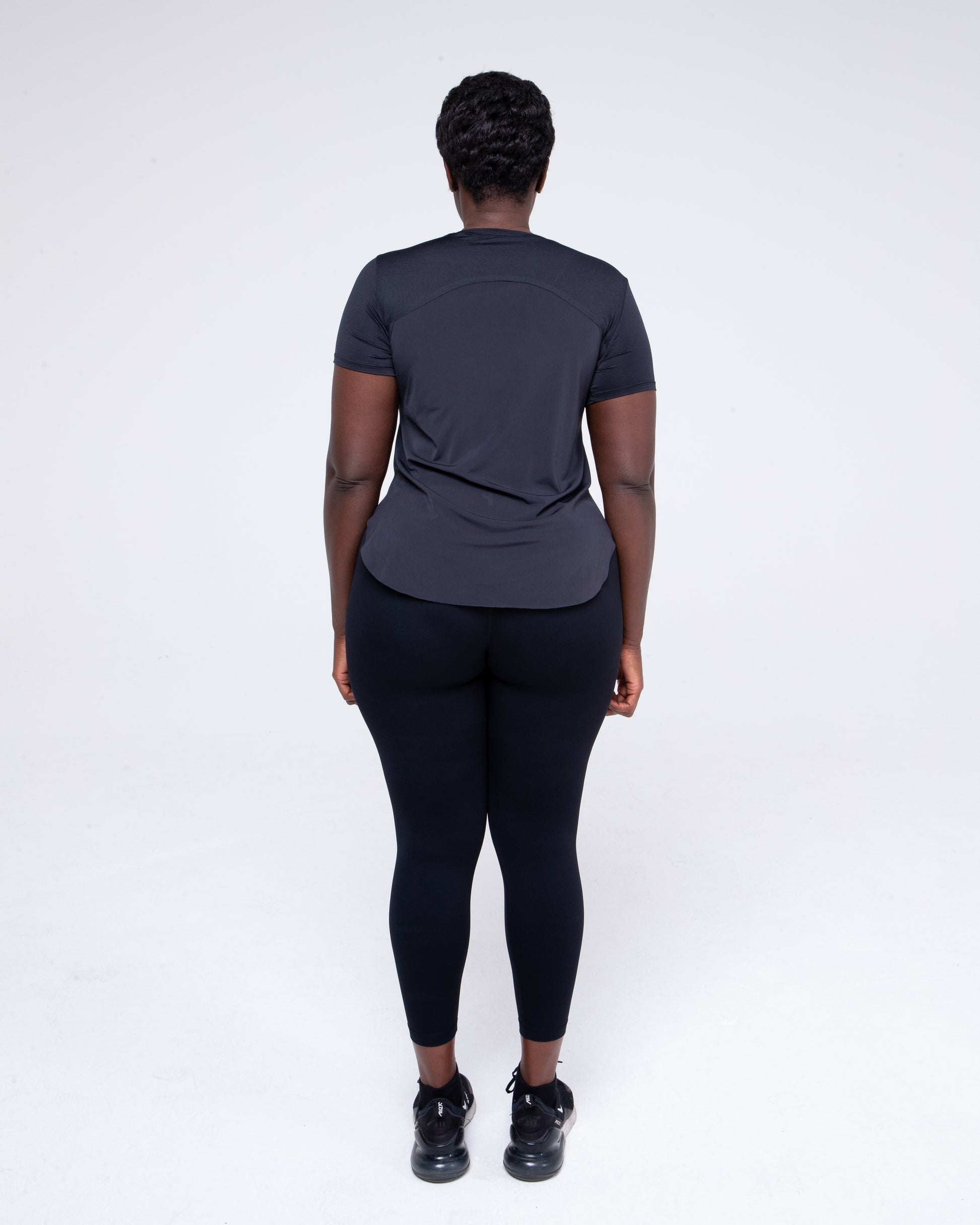 Sculpt Mesh T-Shirt in black full height model shot from the back
