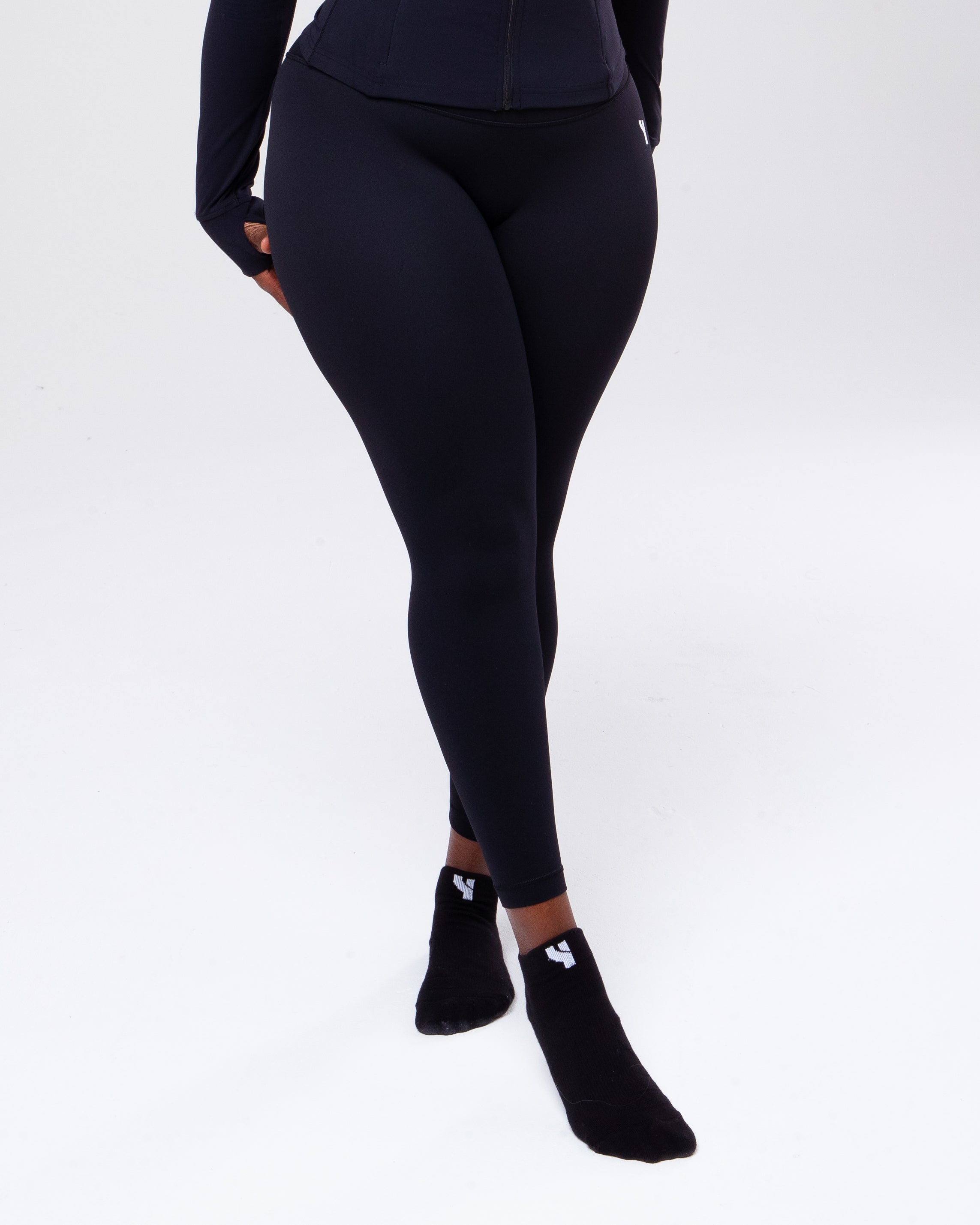 Sculpt High Waisted Leggings in black model shot zoomed for product detail active pose