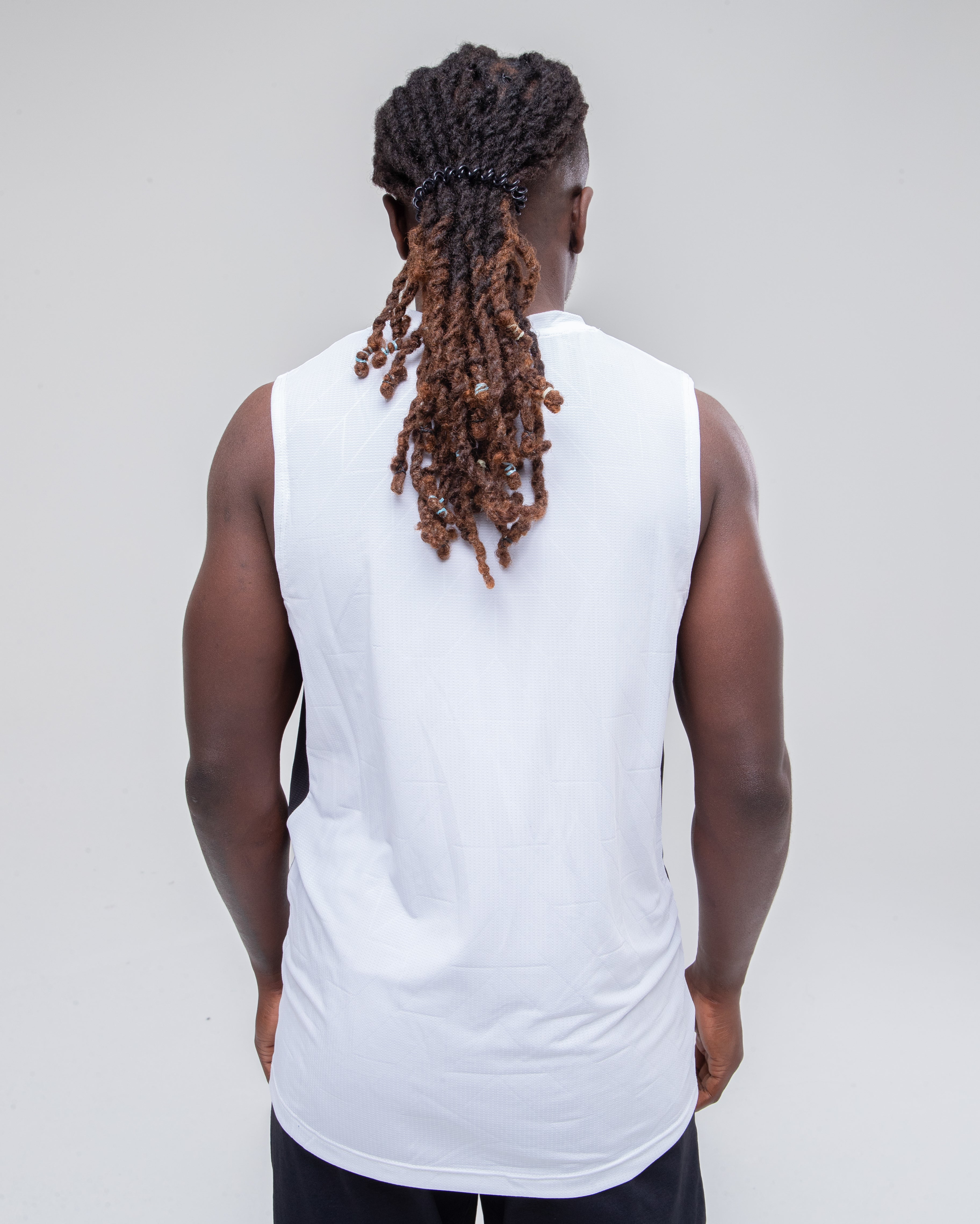 Men’s Sculpt Reflective Vest in white zoomed model shot to detail the back