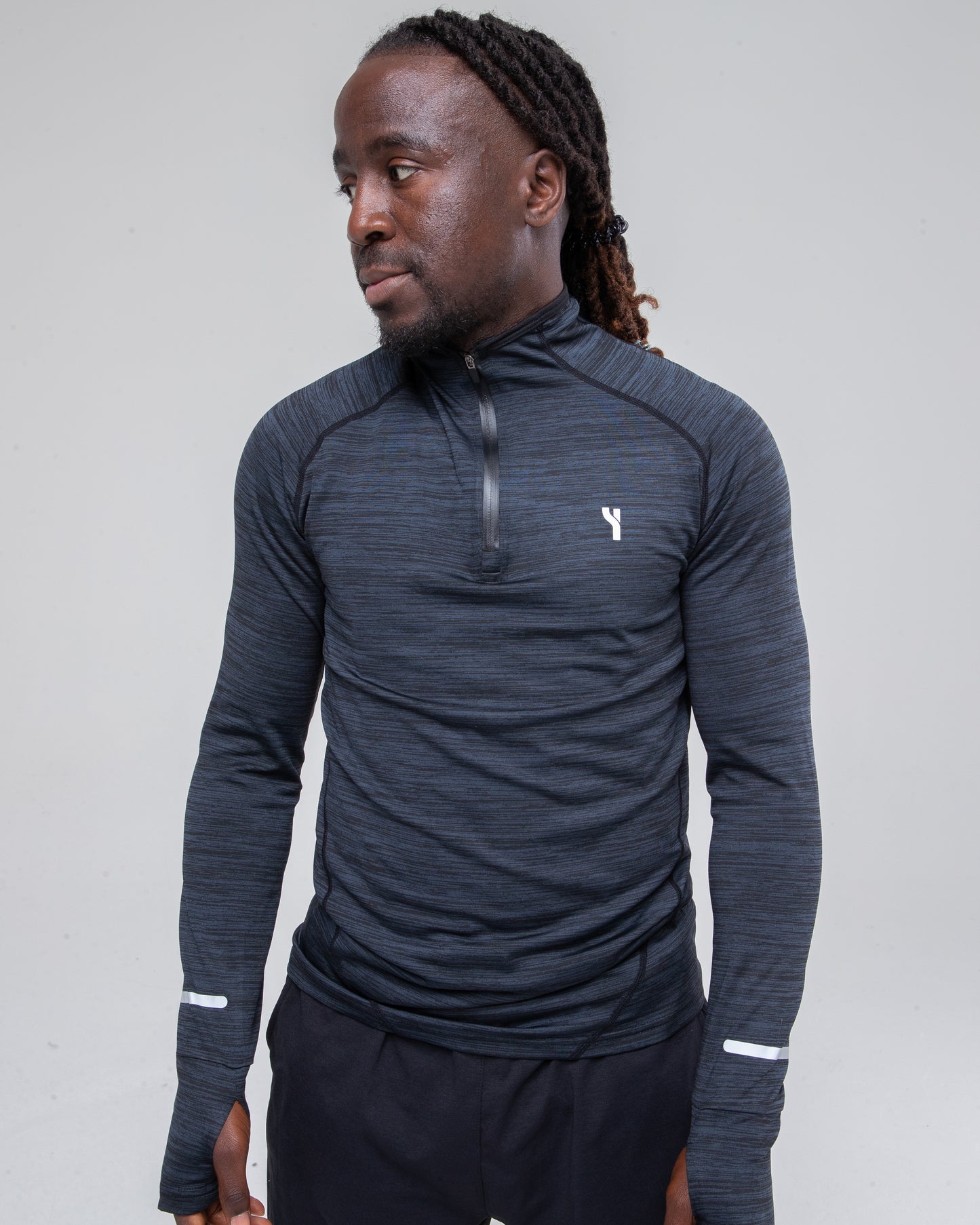 Men’s Sculpt 1/4 Zip Top in black zoomed model shot to detail the front
