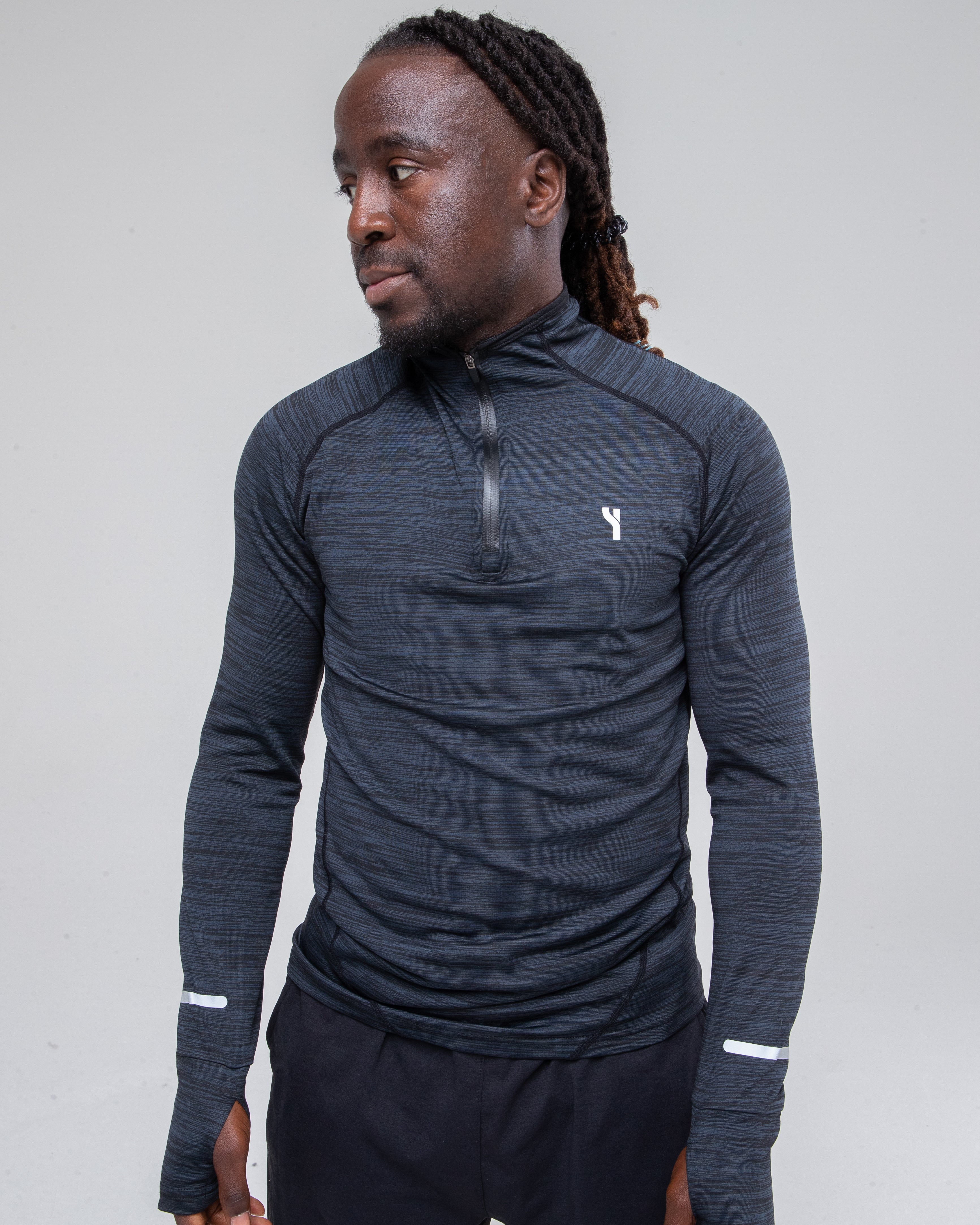 Men’s Sculpt 1/4 Zip Top in black zoomed model shot to detail the front