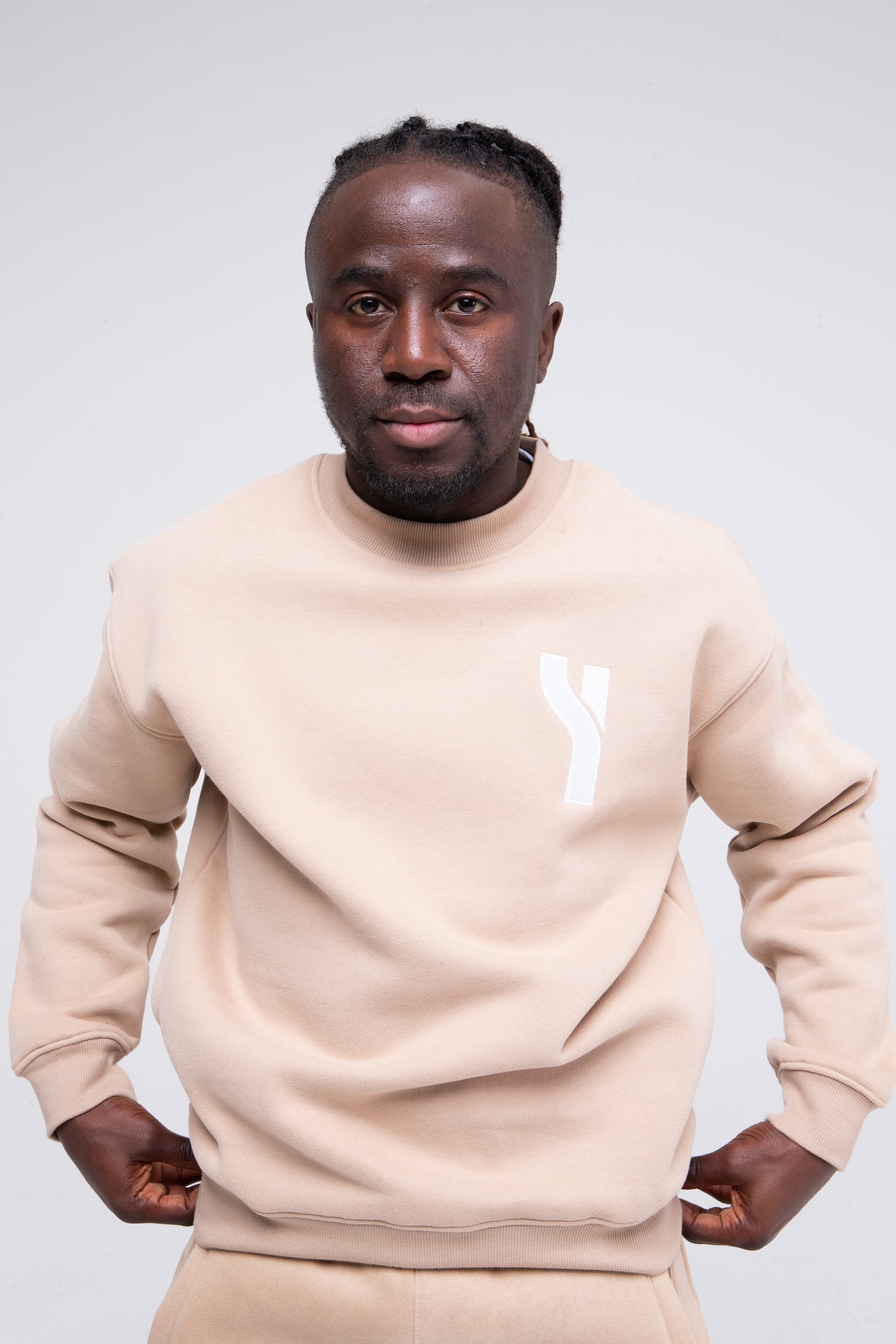 Cosy Crewneck Sweater in beige model shot zoomed to show product detail