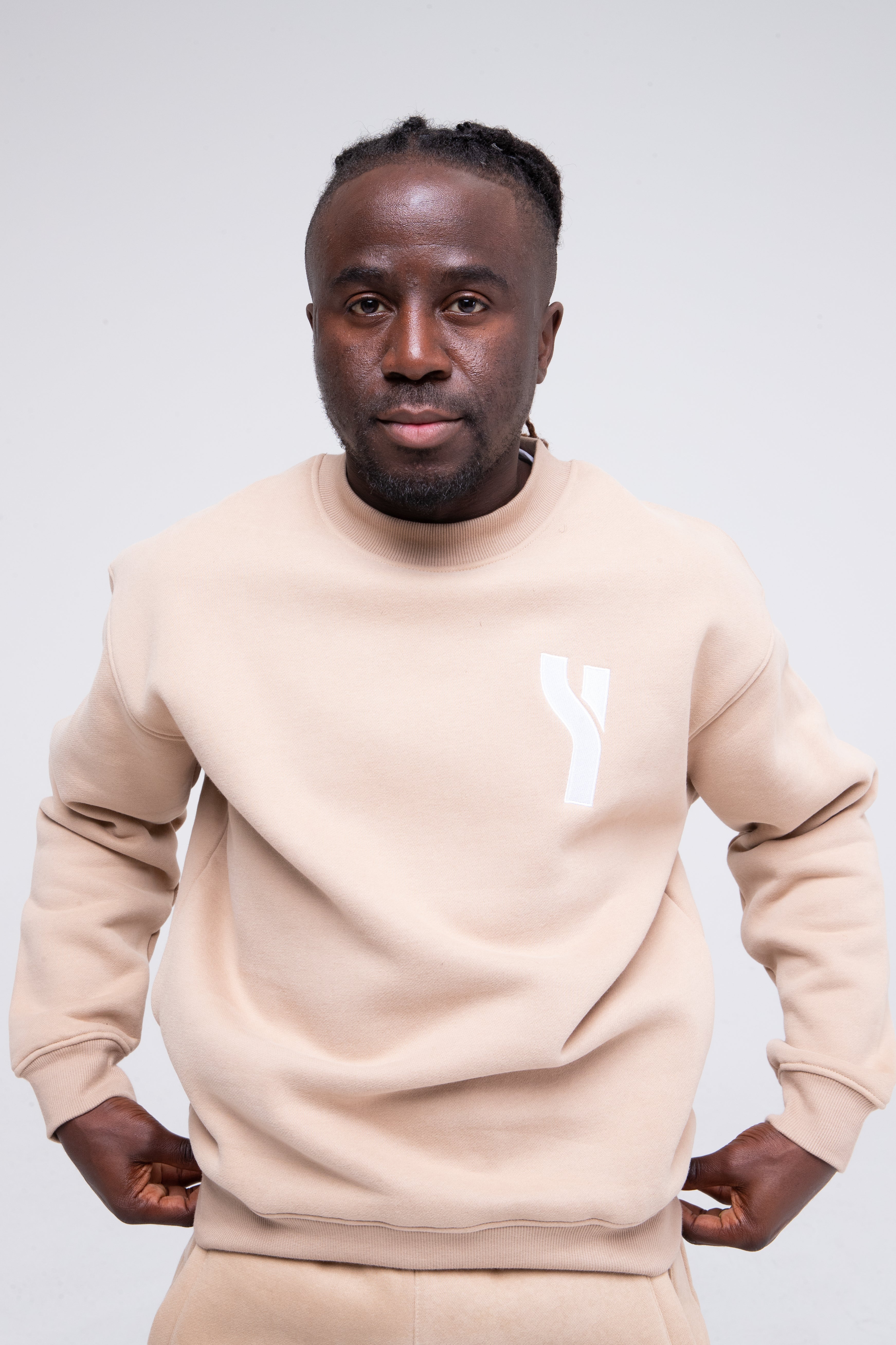 Cosy Crewneck Sweater in beige model shot zoomed to show product detail