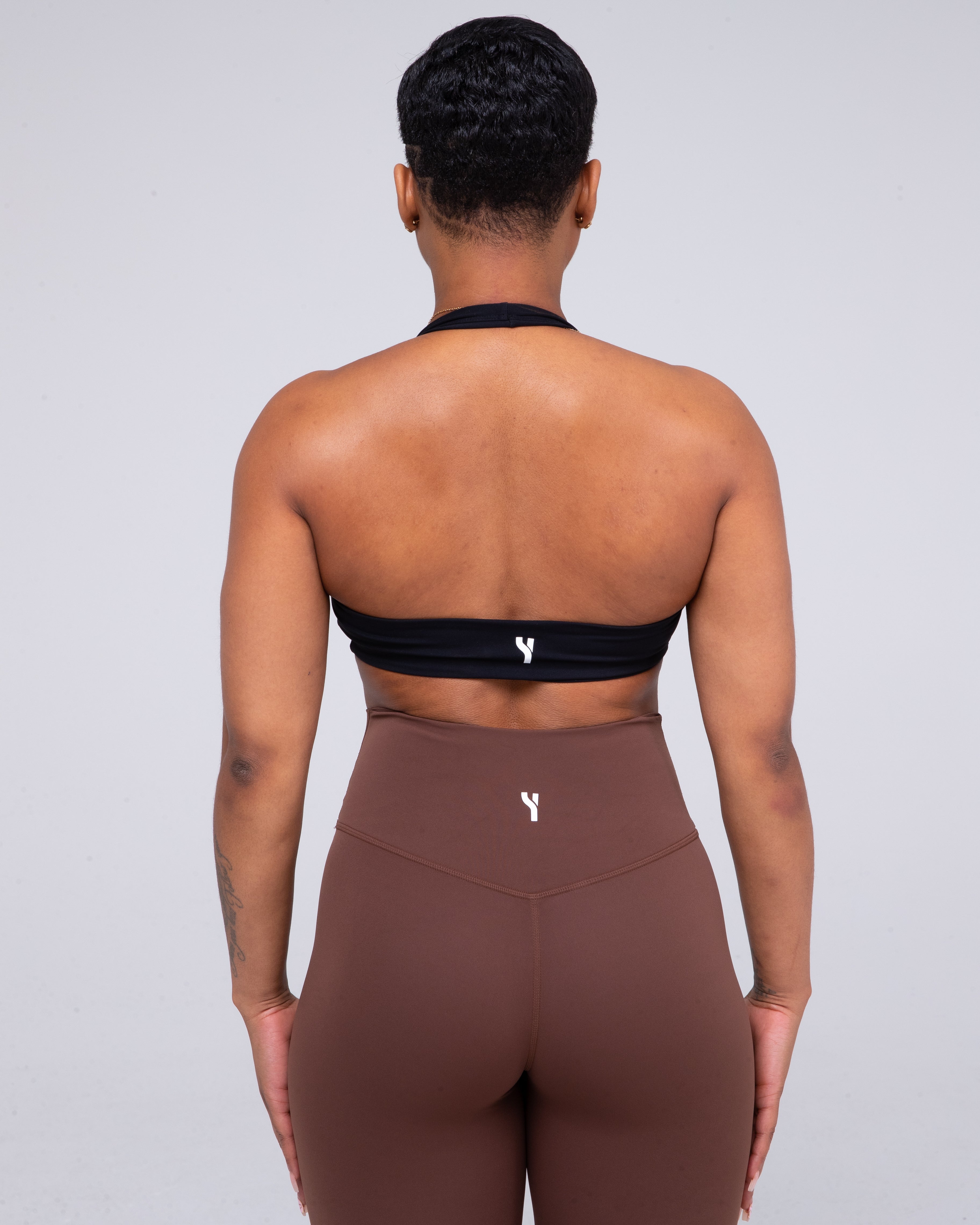 Sculpt Halterneck Sports Bra in black full height model shot from back