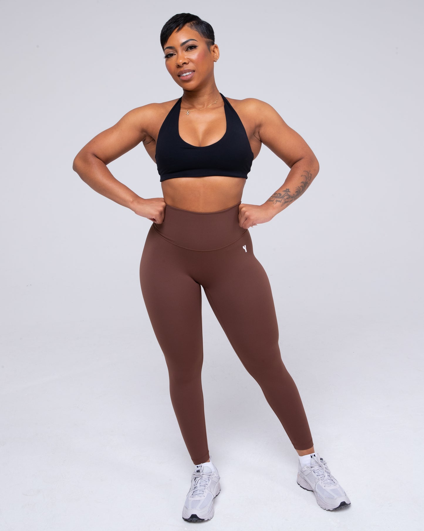 Sculpt Halterneck Sports Bra in black full height model shot from the front