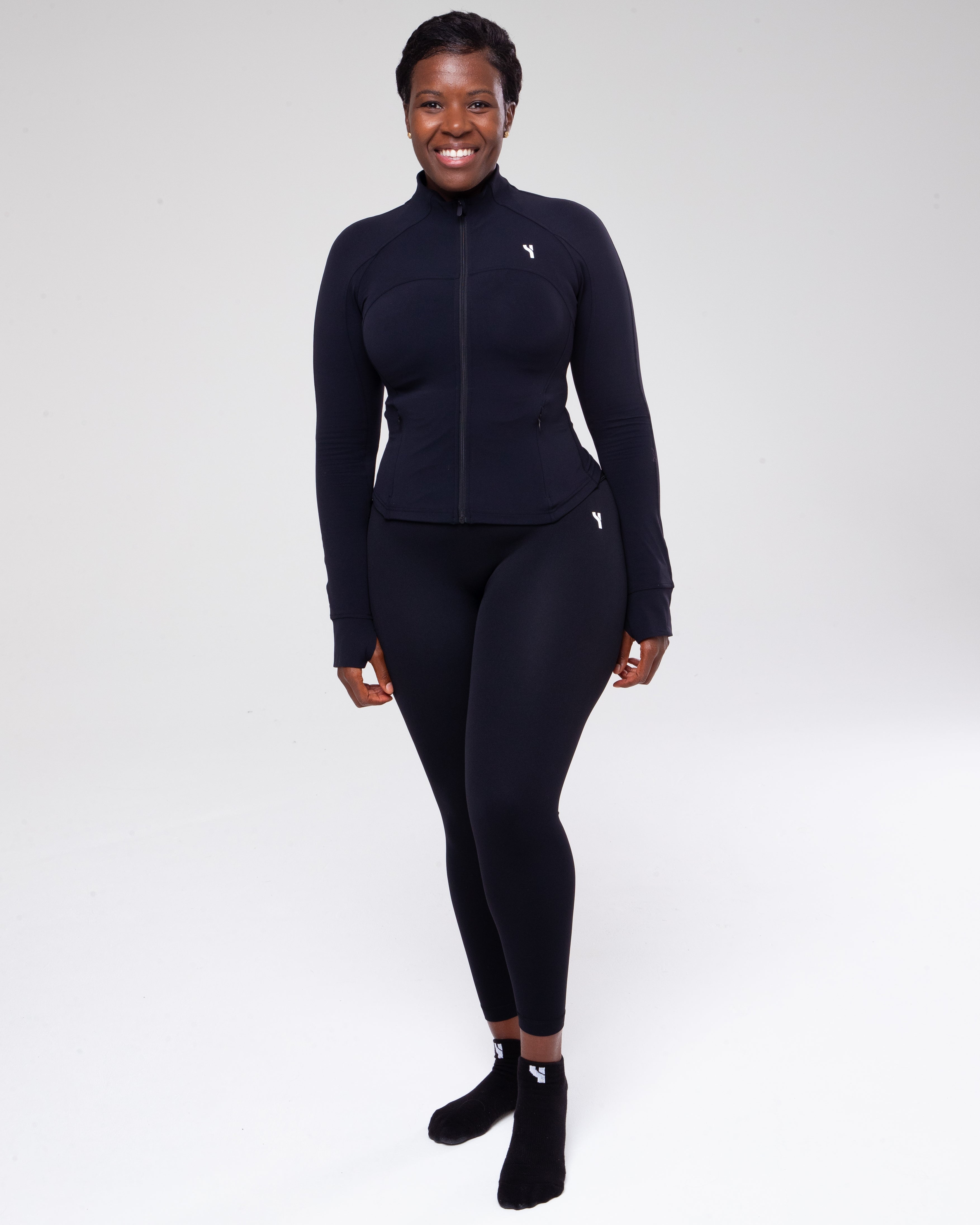 Sculpt 1/4 Zip Jacket in black full height model shot from the front