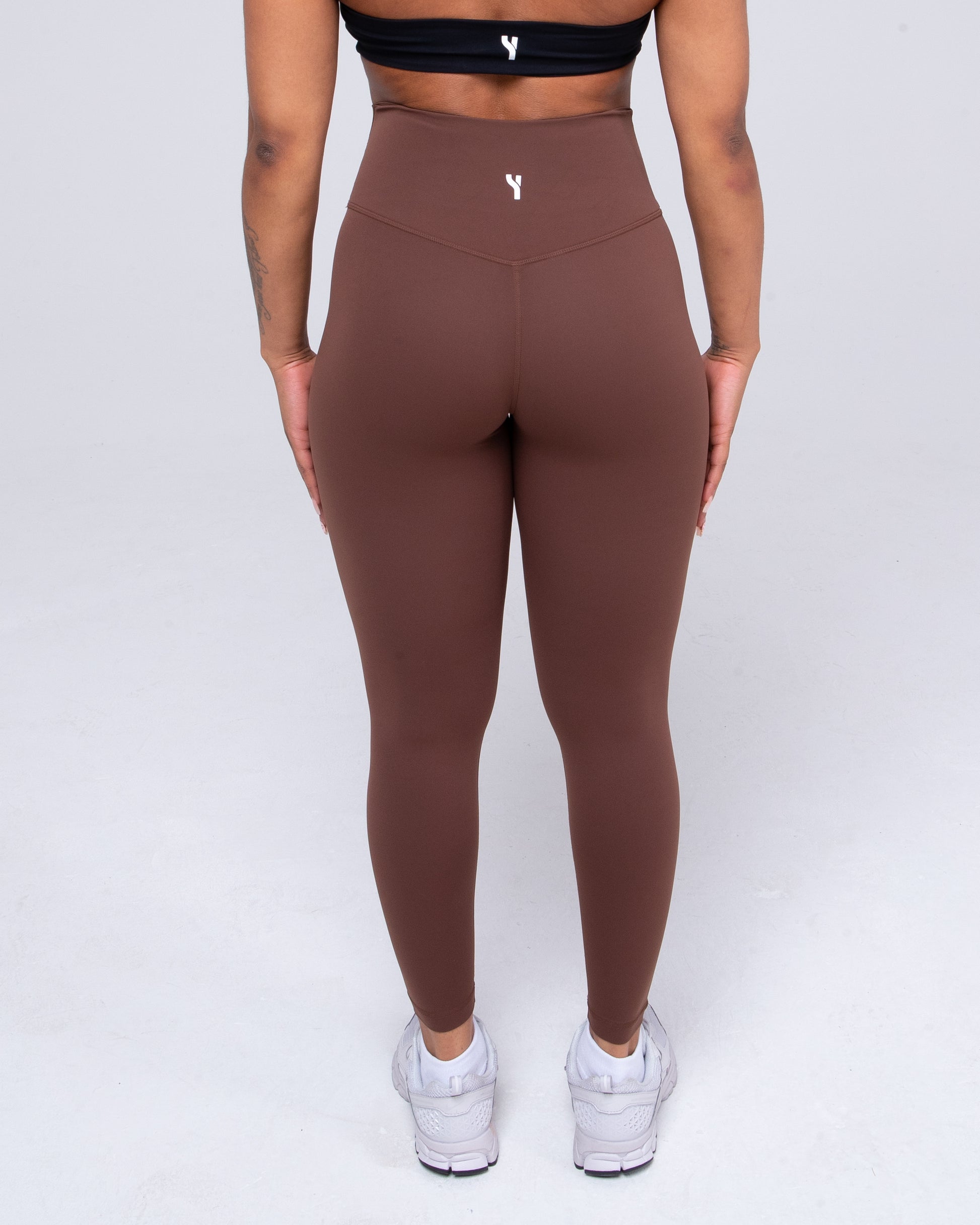 Sculpt High Waisted Leggings in brown detailed from the back